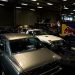 a garage filled with lots of old cars