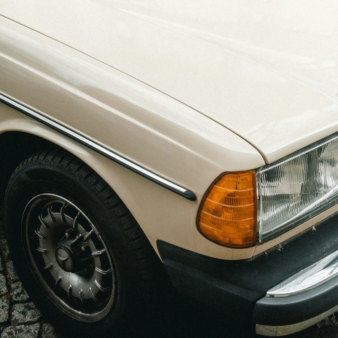 white vehicle showing headlight